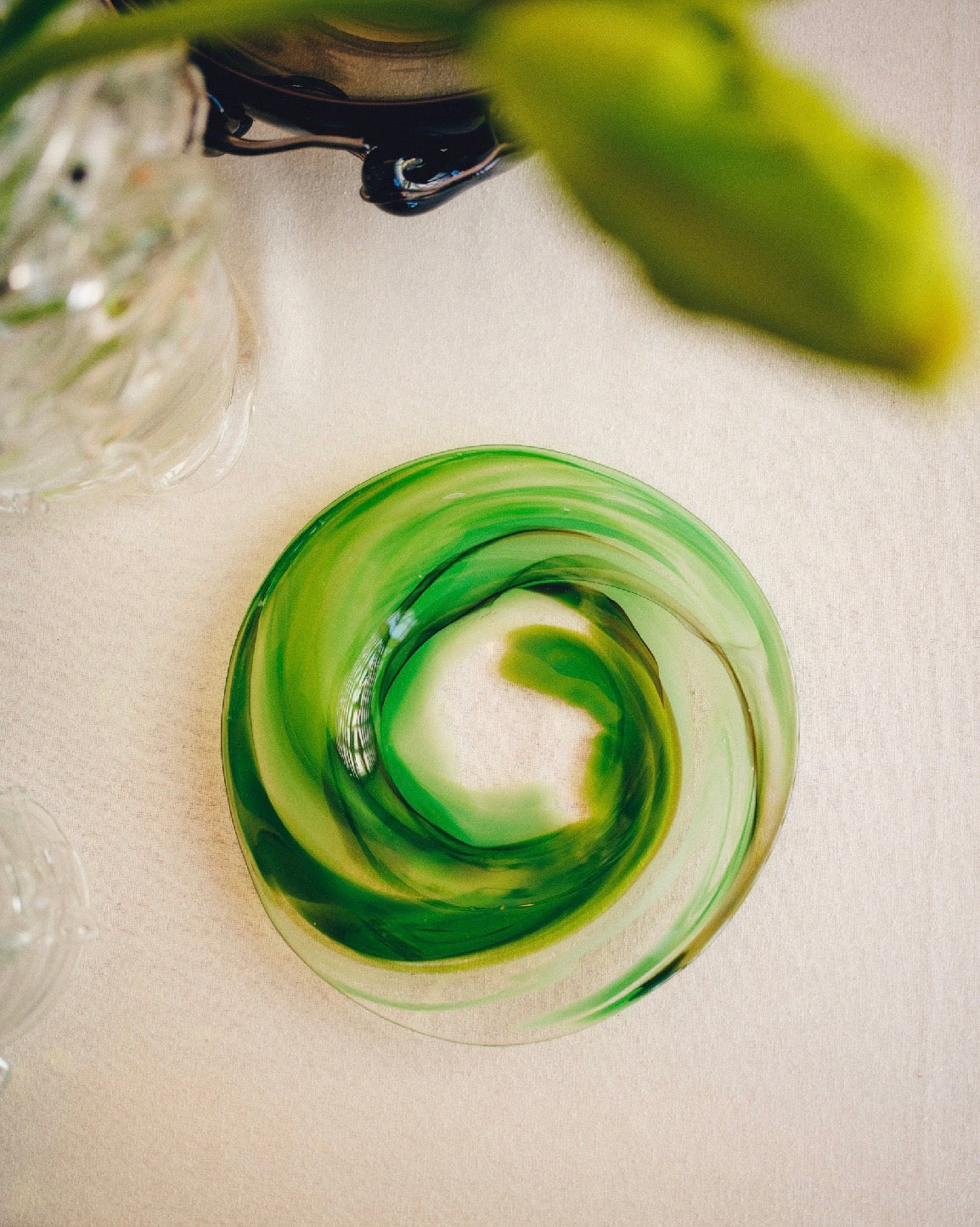 glass dinner plate in moss