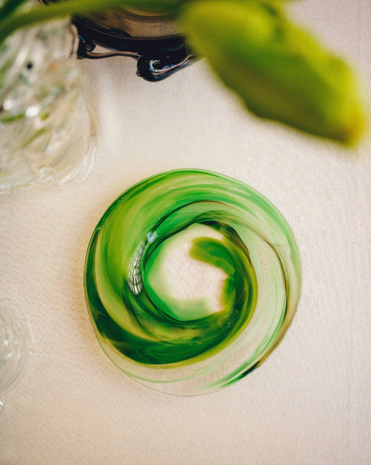 glass dinner plate in moss